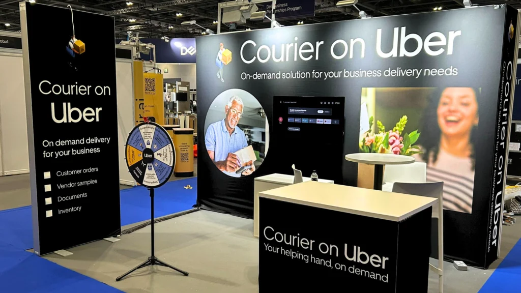 A trade show booth for Courier on Uber, an on-demand delivery solution for businesses.
