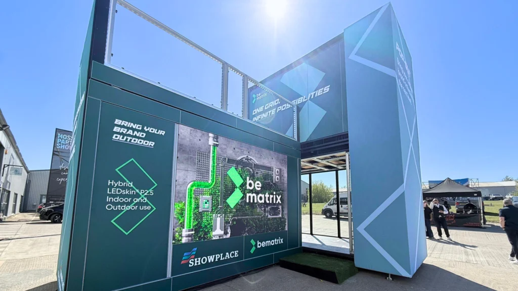 A modular outdoor display structure branded with beMatrix and Showplace signage.