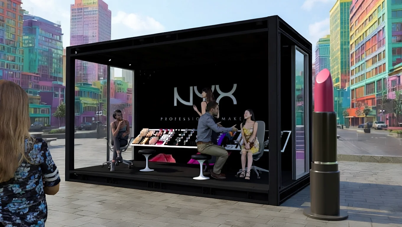 A NYX Professional Makeup pop-up studio features a display of cosmetics and a consultation area in a city plaza.